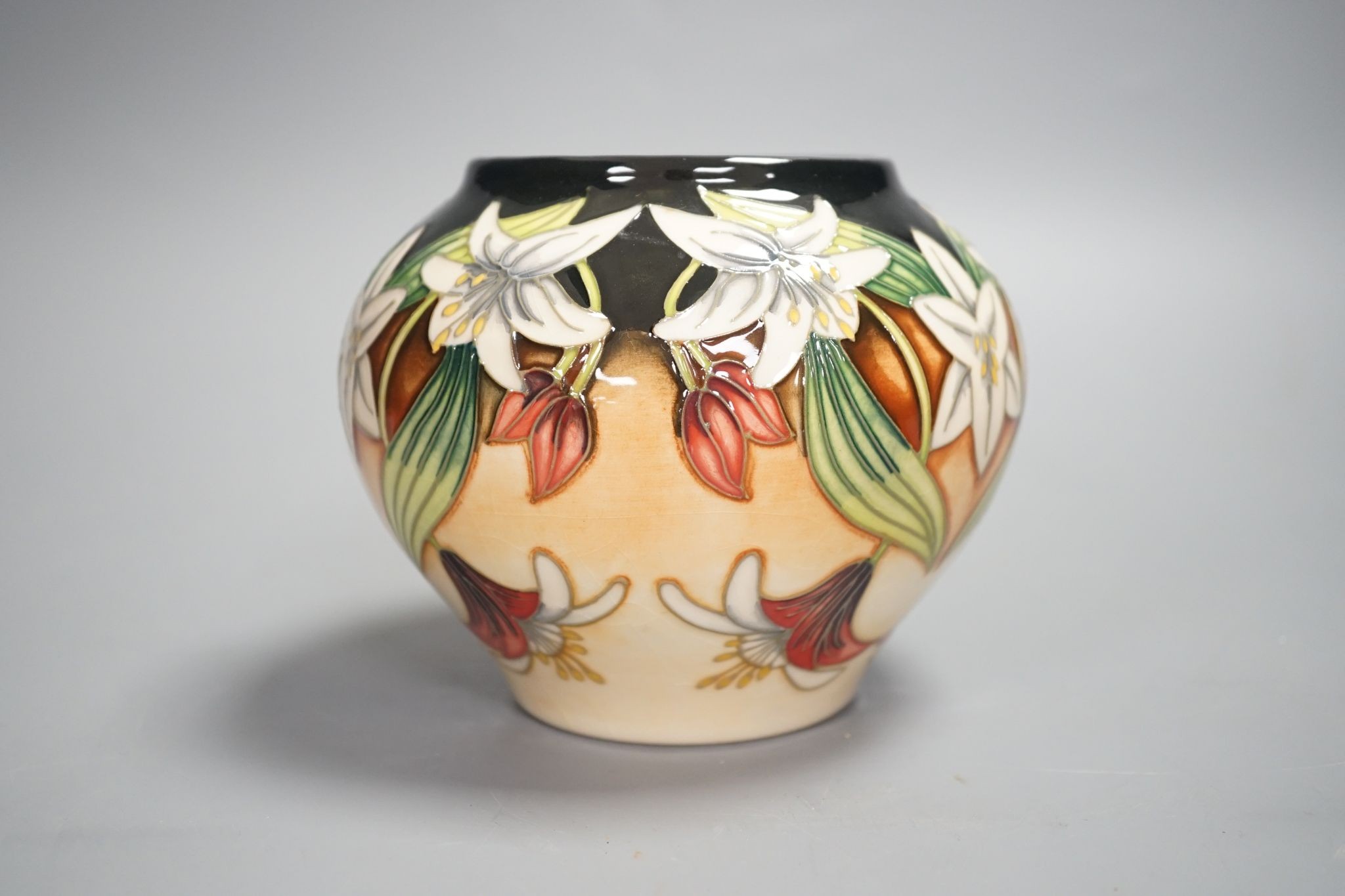 A Moorcroft squat limited edition vase signed Angi Davenport, 11 cms high.